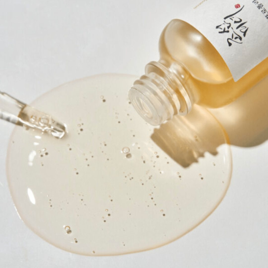 a bottle with liquid spilling out of it