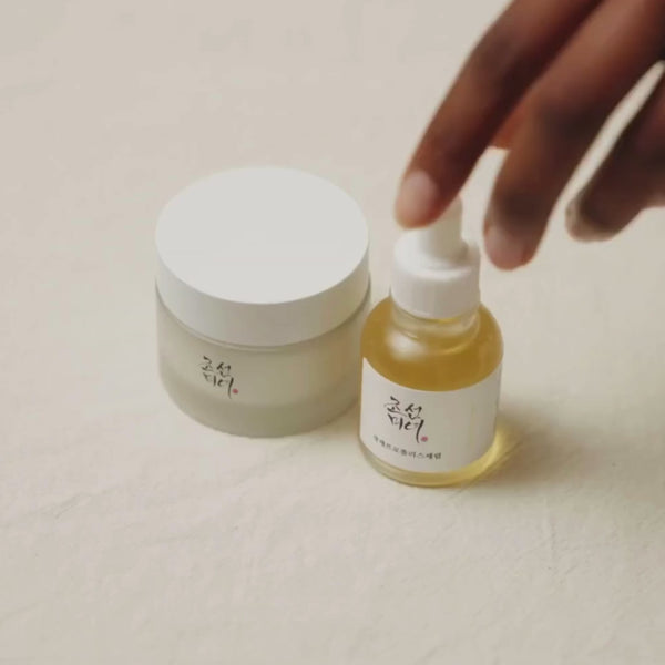 2-3 drops of the Glow Serum fallback image
