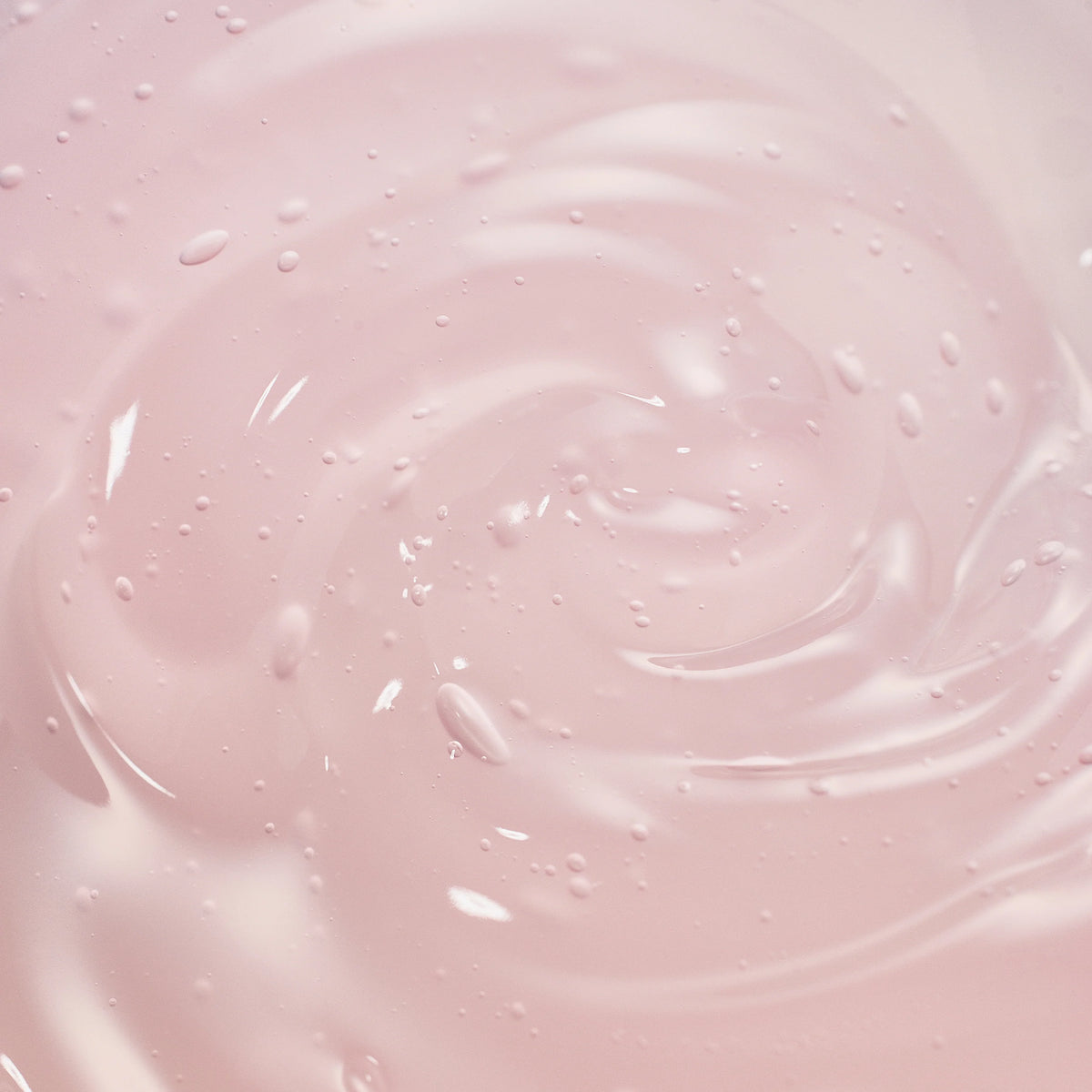 a close up of a pink liquid